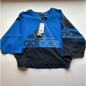Adidas women’s must haves color block cropped shirt in blue. Size large.